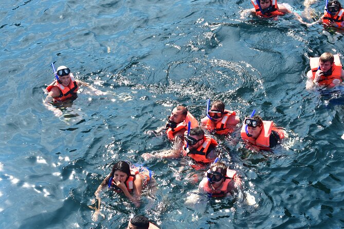 Catamaran Tour to the Arches, Playa las Animas, Snorkeling and more - Back to Puerto Mágico: games, views, and the reality of re-boarding time
