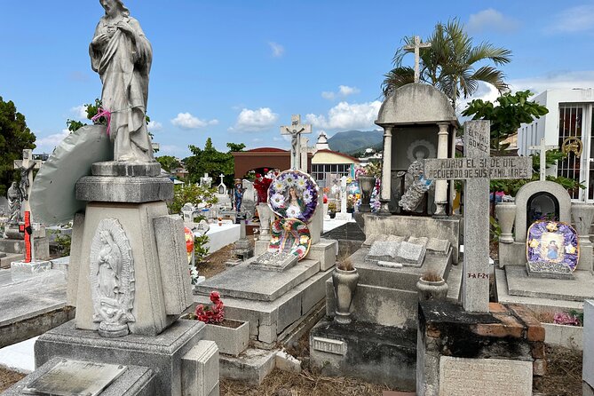 Day of the Dead inspired Cemetery Tour in Puerto Vallarta - Stop 1: Puerto Vallarta’s older cemetery, murals, and the death-cult shrine area