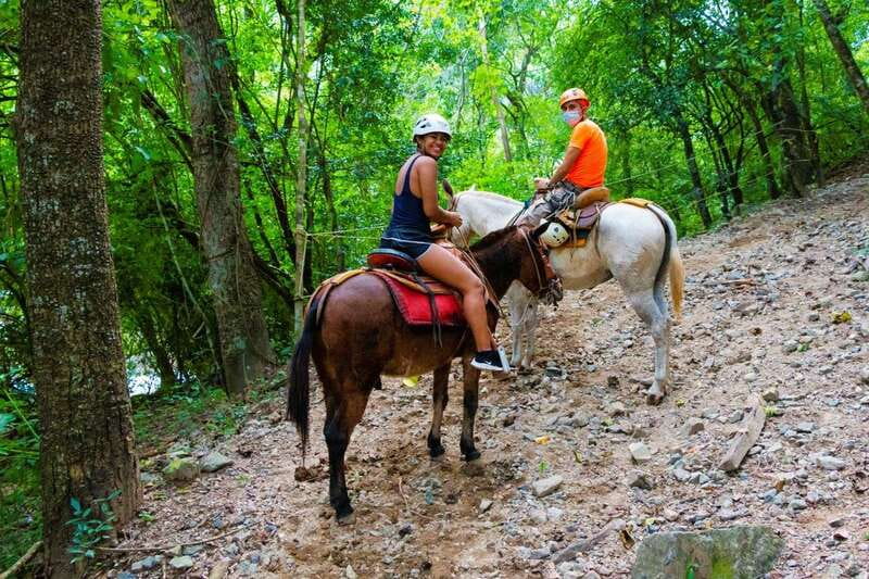 From Puerto Vallarta & Nuevo Vallarta: Canopy Zipline Tour - Canopy ziplining above the river: the fast 11-line circuit