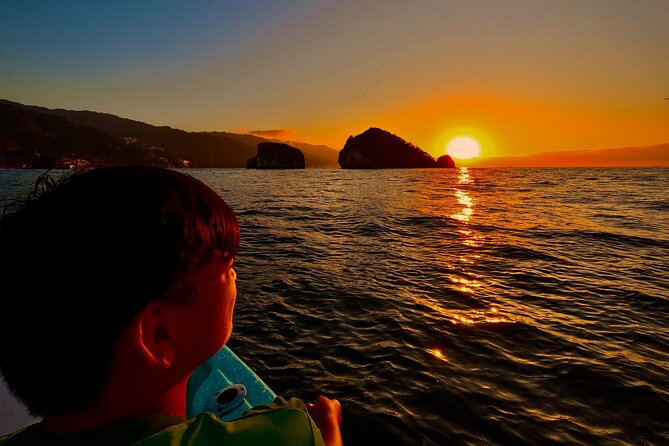 Sunset and Bioluminescence Boat Tour at Los Arcos Islands - Los Arcos de Mismaloya at golden hour: birds and rock arches