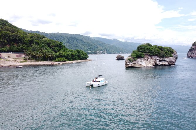 Visit Private Beaches around Puerto Vallarta in a Private Yacht - Stop 2: Playa Paredon for quiet sea-only access and paddleboard photos